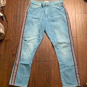 Distressed jeans w/ red,white,&black decal strips